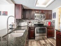 More Details about MLS # 20746816 : 1609 MARSH LANE #107